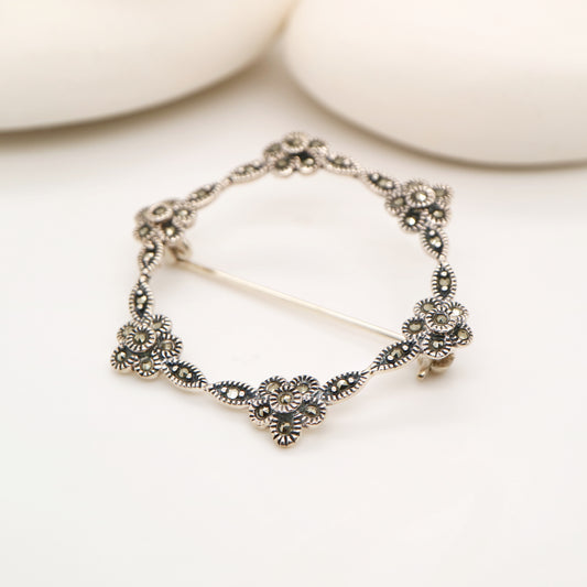 Flower hoop brooch in marcasite and silver