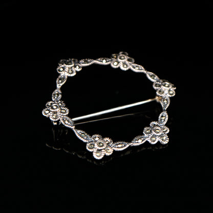 Flower hoop brooch in marcasite and silver