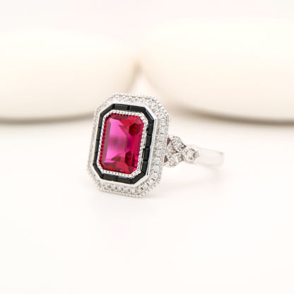 Art deco ring with laboratory grown ruby, onyx and cz halo in sterling silver