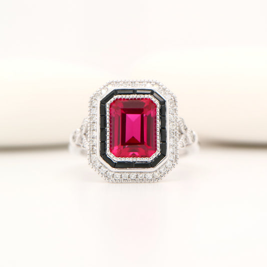 Art deco ring with laboratory grown ruby, onyx and cz halo in sterling silver