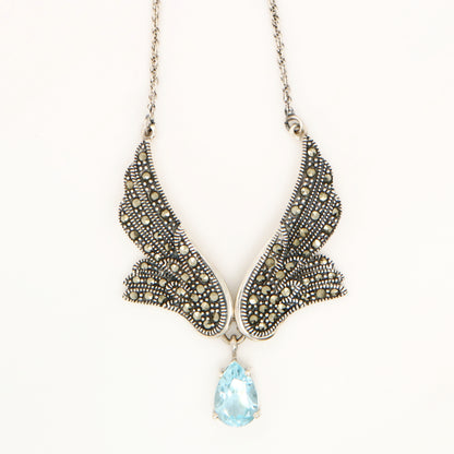 Angel Wing necklace in Silver with Marcasite and Blue Topaz Drop