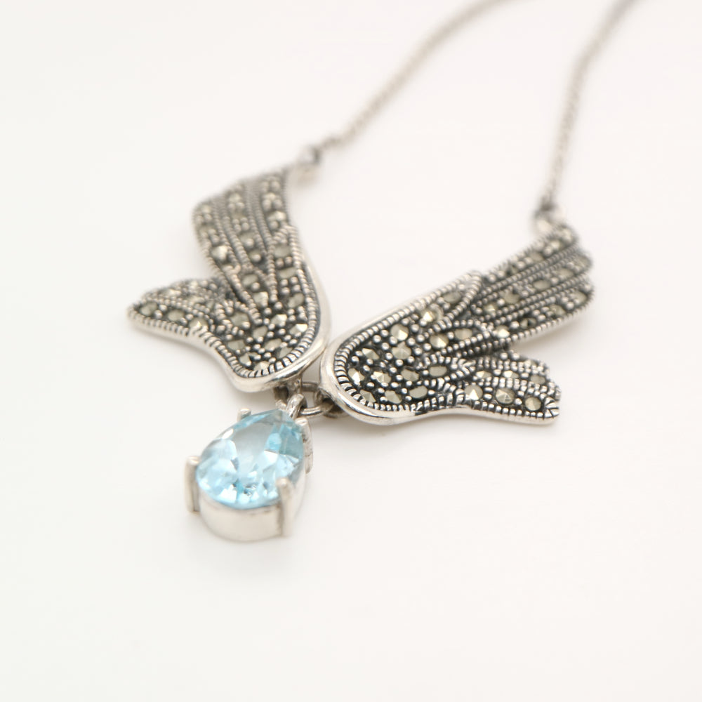 Angel Wing necklace in Silver with Marcasite and Blue Topaz Drop