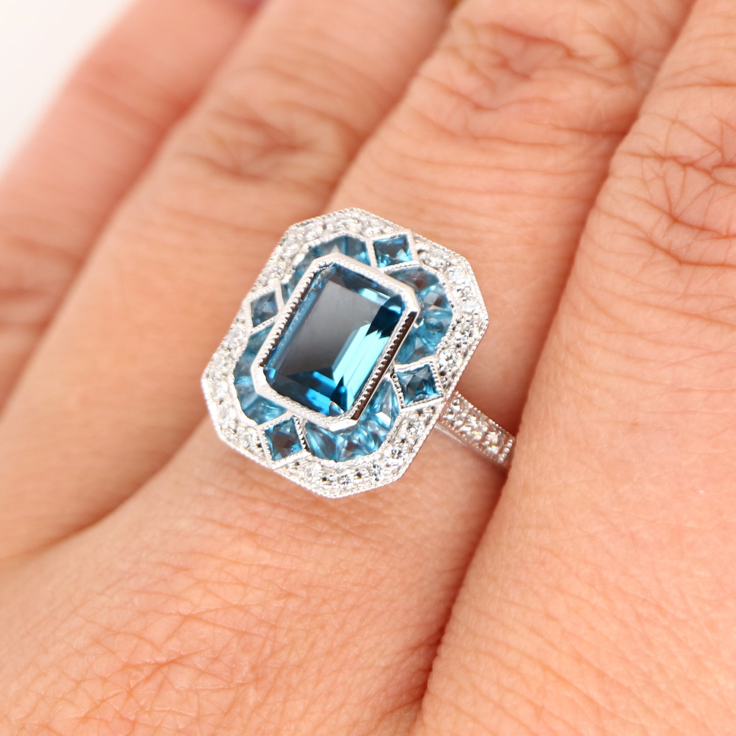 Art deco cocktail ring with london blue topaz and diamond in white gold