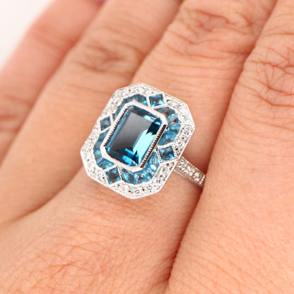 Art deco cocktail ring with london blue topaz and diamond in white gold