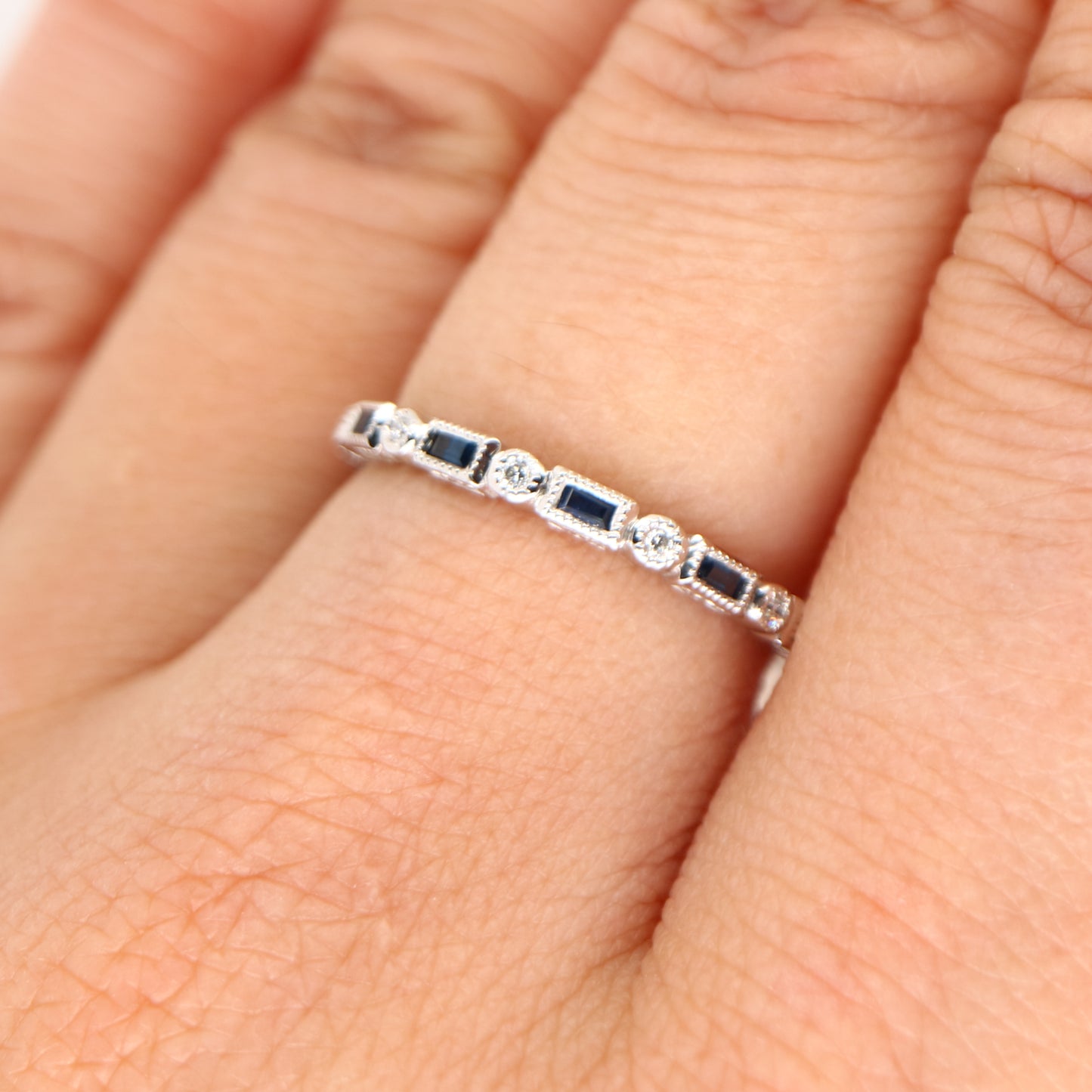 Art deco half set band in solid white gold with sapphires and diamonds