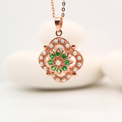 Pearl and tsavorite garnet pendant in 9k rose gold