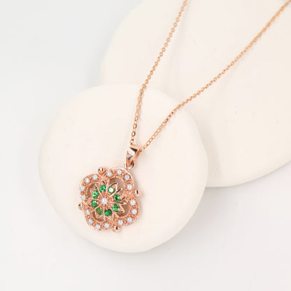 Pearl and tsavorite garnet pendant in 9k rose gold