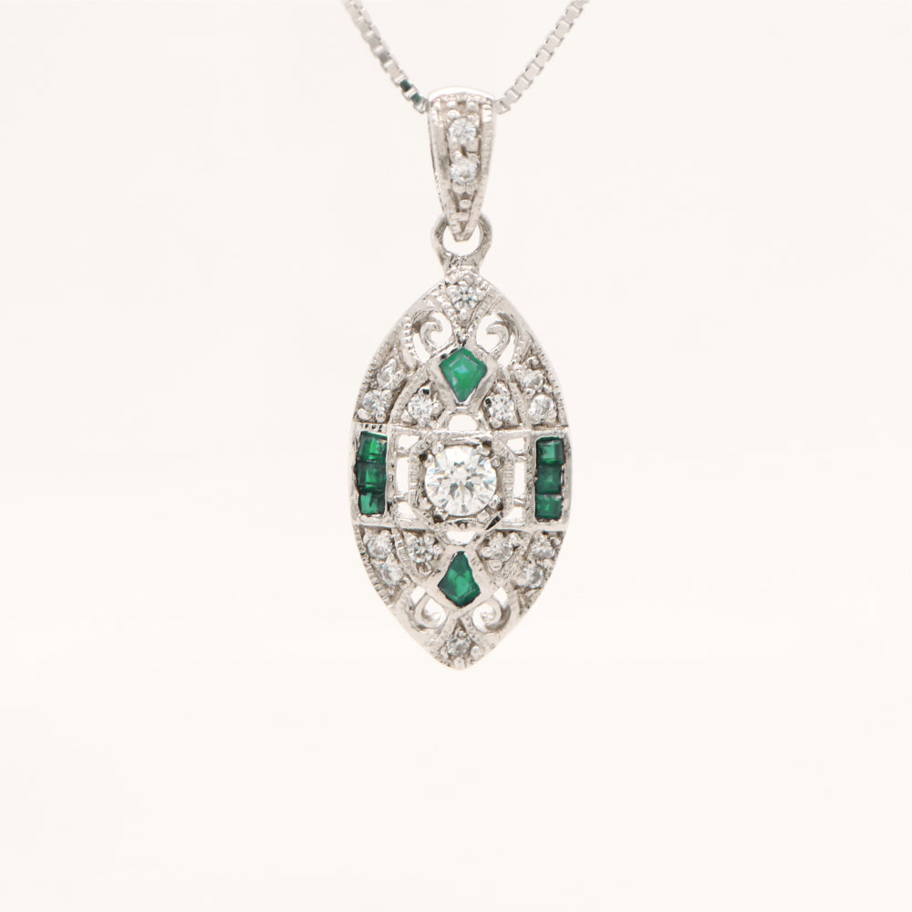 Vintage natural emerald and diamond shield pendant in 9k white gold