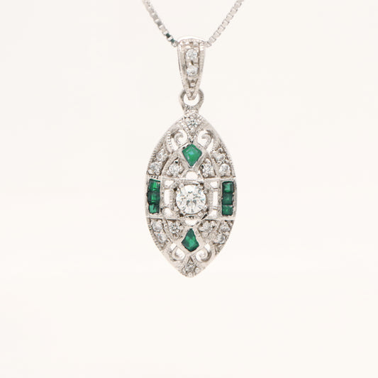Vintage natural emerald and diamond shield pendant in 9k white gold