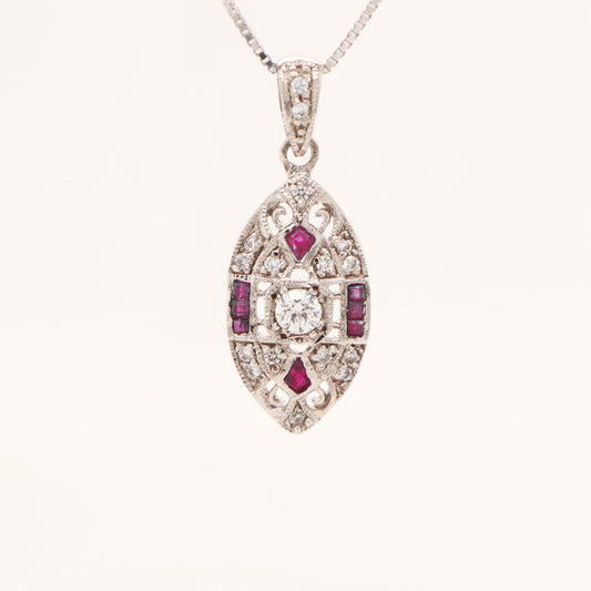 Vintage natural ruby and diamond shield pendant in 9k white gold