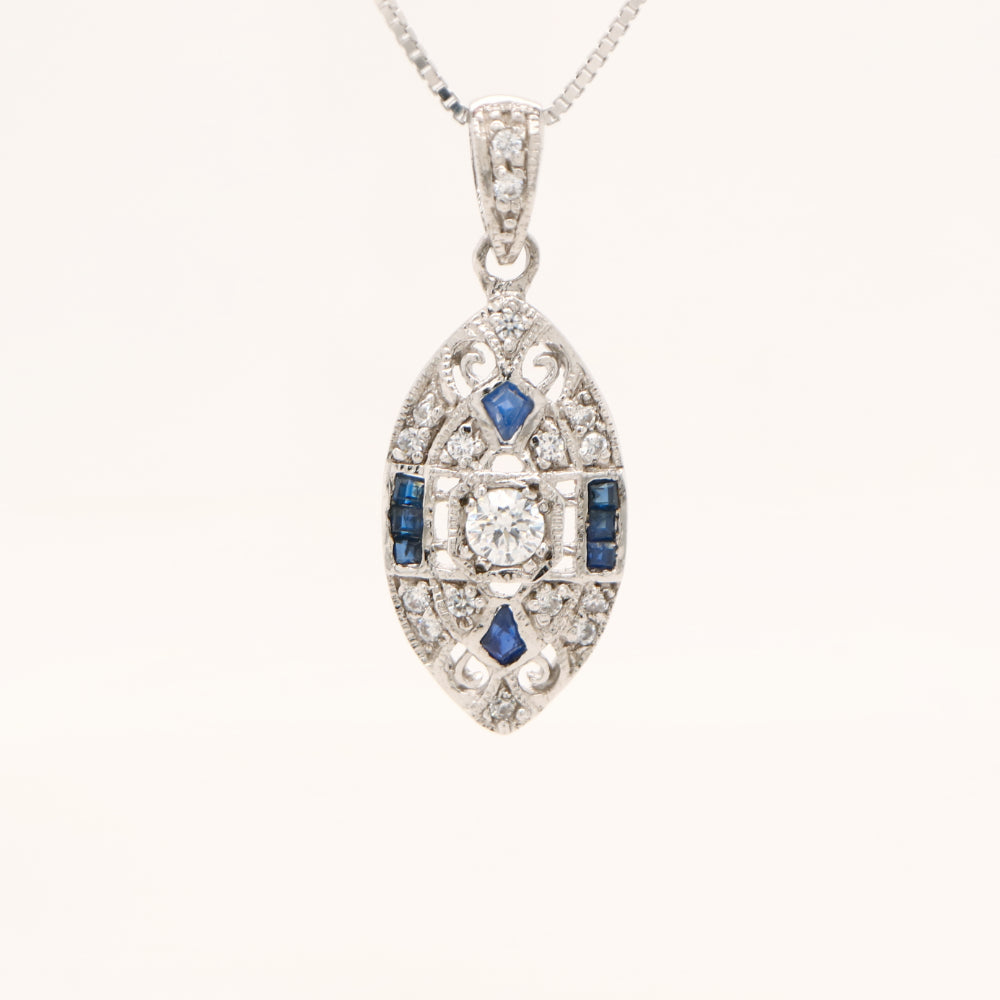 Vintage natural sapphire and diamond shield pendant in 9k white gold