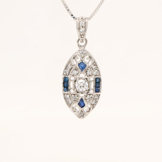Vintage natural sapphire and diamond shield pendant in 9k white gold