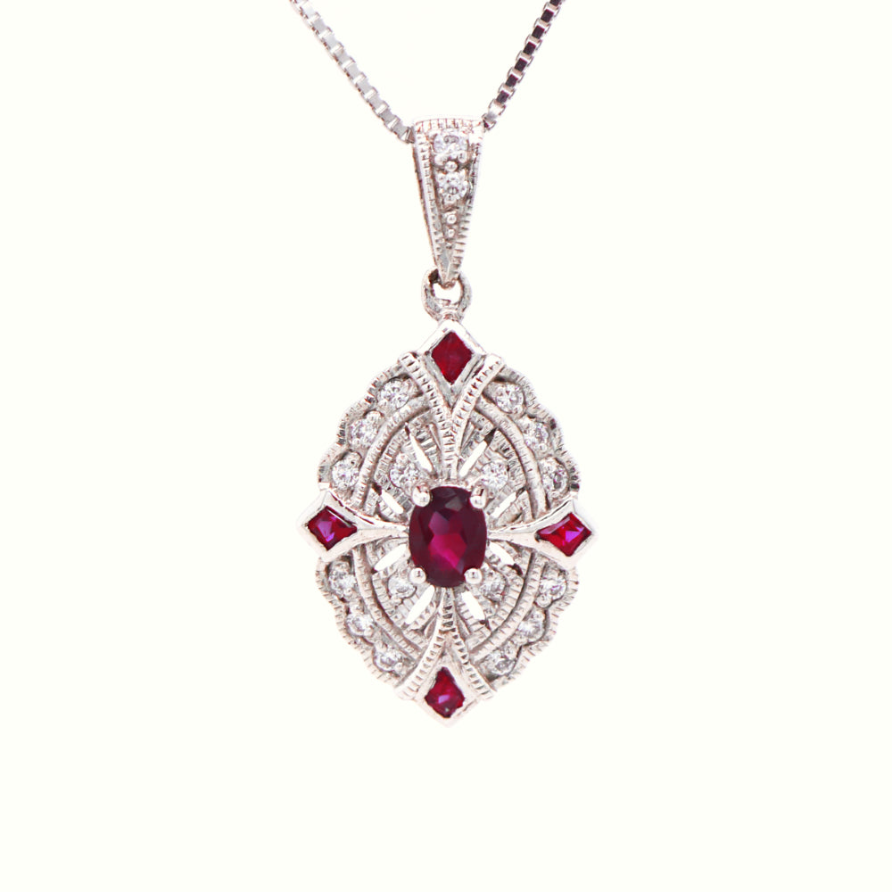 Victorian shield style scalloped edge pendant with natural ruby and diamond in 9k white gold