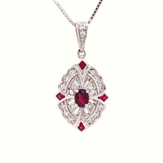 Victorian shield style scalloped edge pendant with natural ruby and diamond in 9k white gold