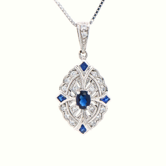 Victorian shield style scalloped edge pendant with natural sapphire and diamond in white gold