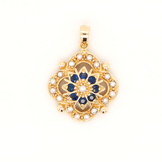 Pearl and natural sapphire pendant in 9k yellow gold