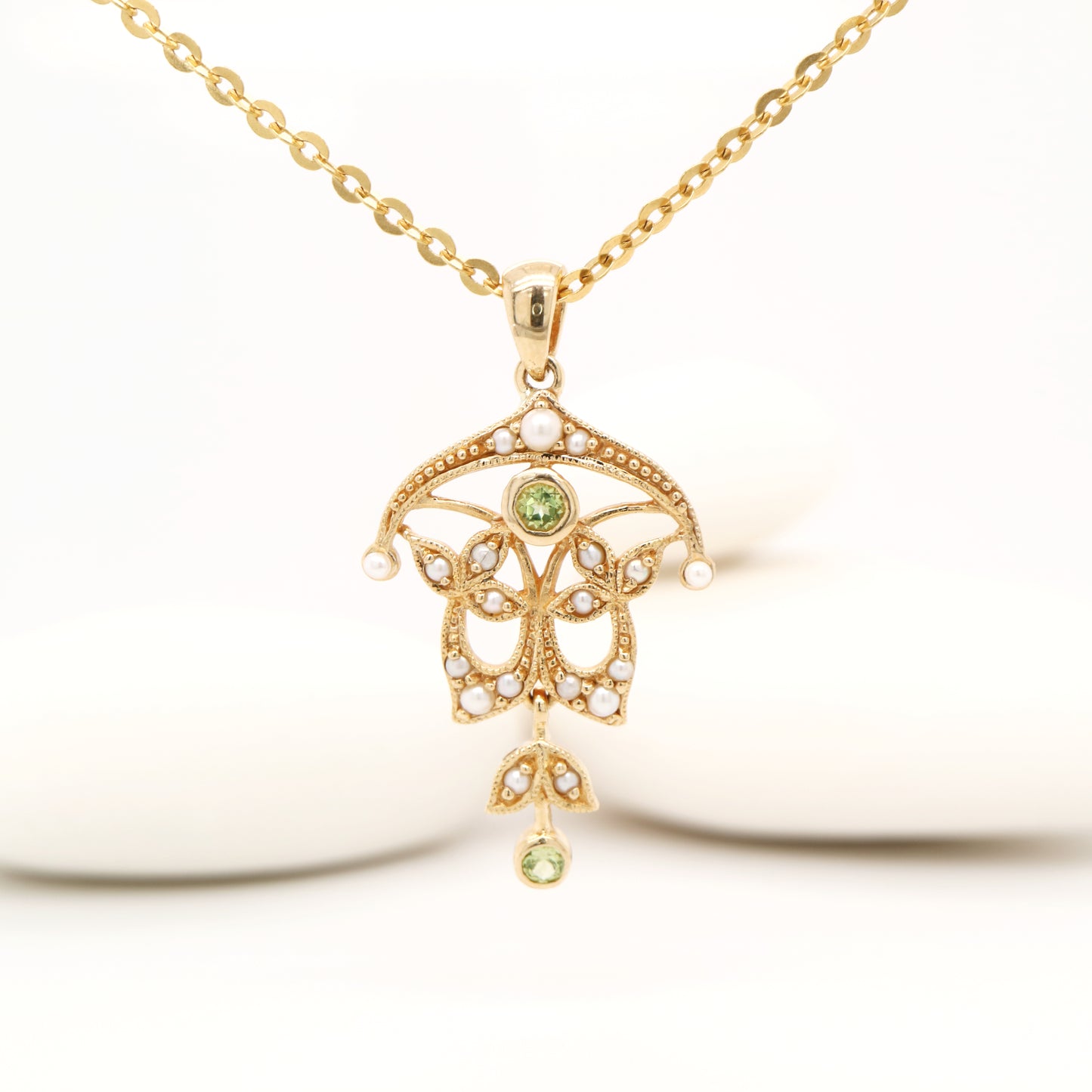 Edwardian style peridot and pearl pendant in 9k yellow gold