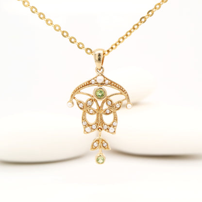 Edwardian style peridot and pearl pendant in 9k yellow gold