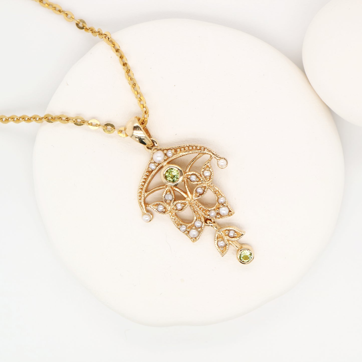 Edwardian style peridot and pearl pendant in 9k yellow gold
