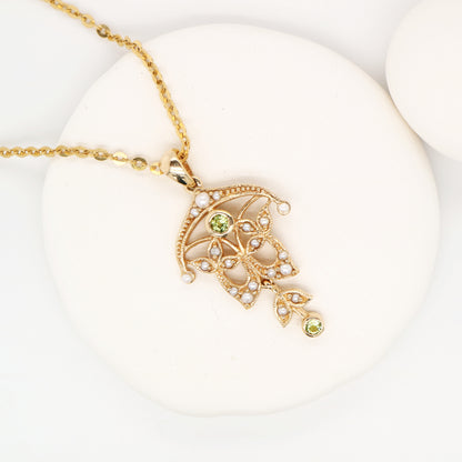 Edwardian style peridot and pearl pendant in 9k yellow gold