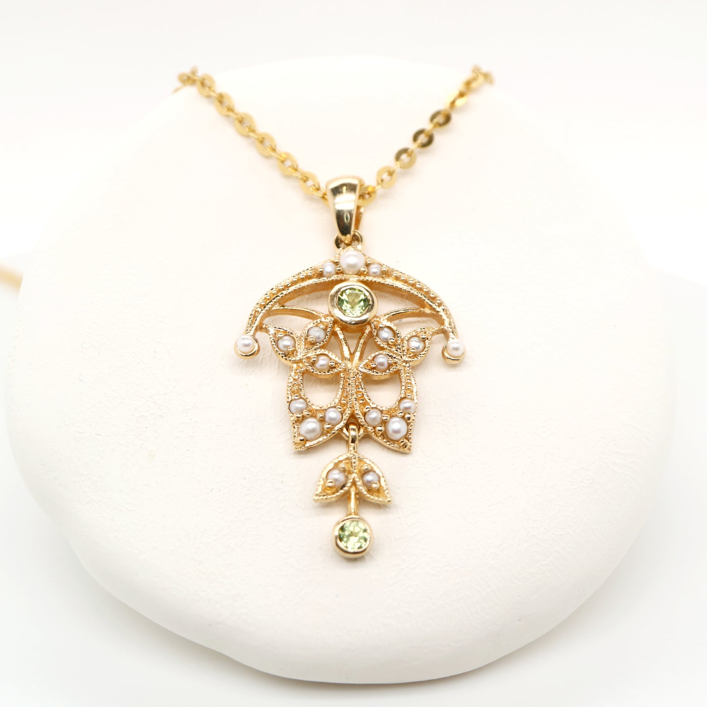 Edwardian style peridot and pearl pendant in 9k yellow gold