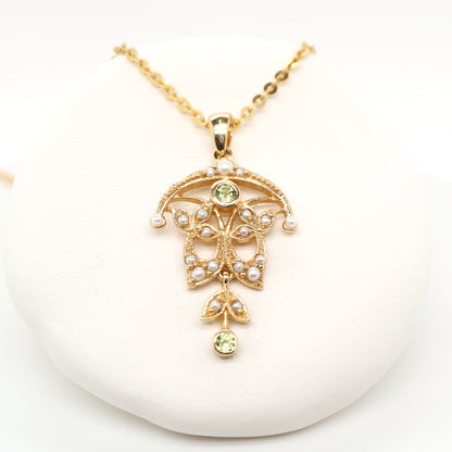 Edwardian style peridot and pearl pendant in 9k yellow gold