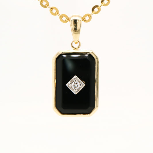 Art deco style pendant with onyx and diamonds in 9k yellow gold