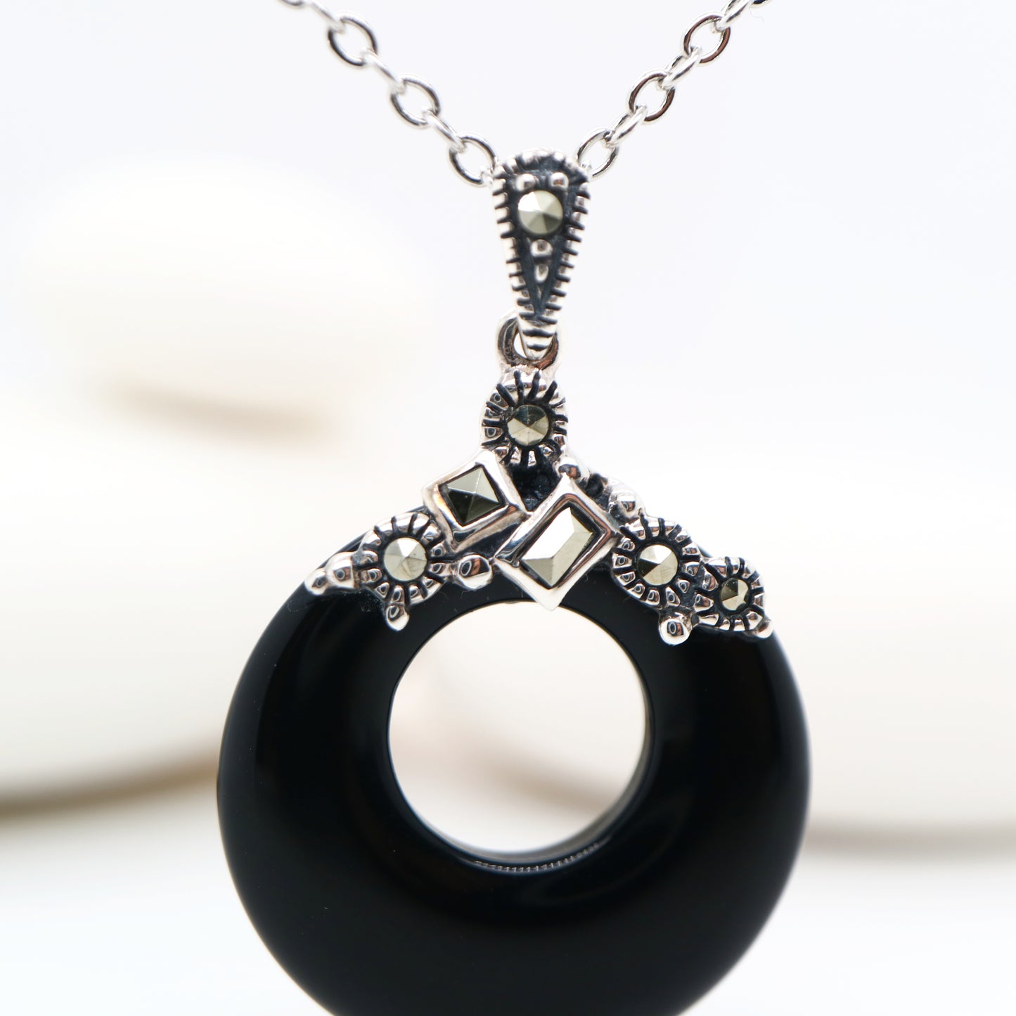 Onyx hoop pendant with marcasite in Sterling Silver