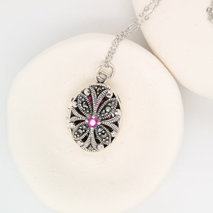 Flower Locket in Sterling Silver with Ruby and Marcasite