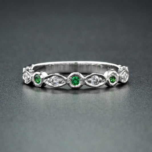 Art deco style half set band in solid white gold with emeralds and diamonds
