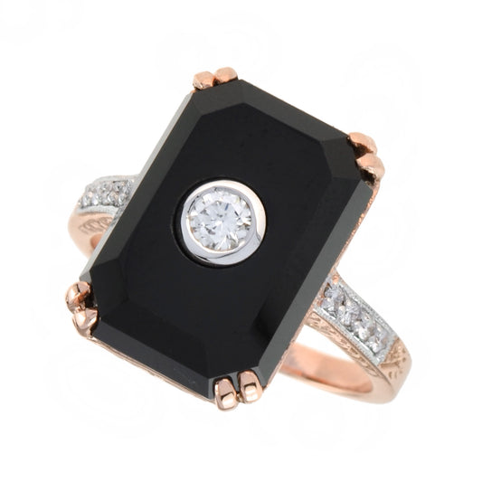 central diamond with onyx cocktail ring in 9k rose gold