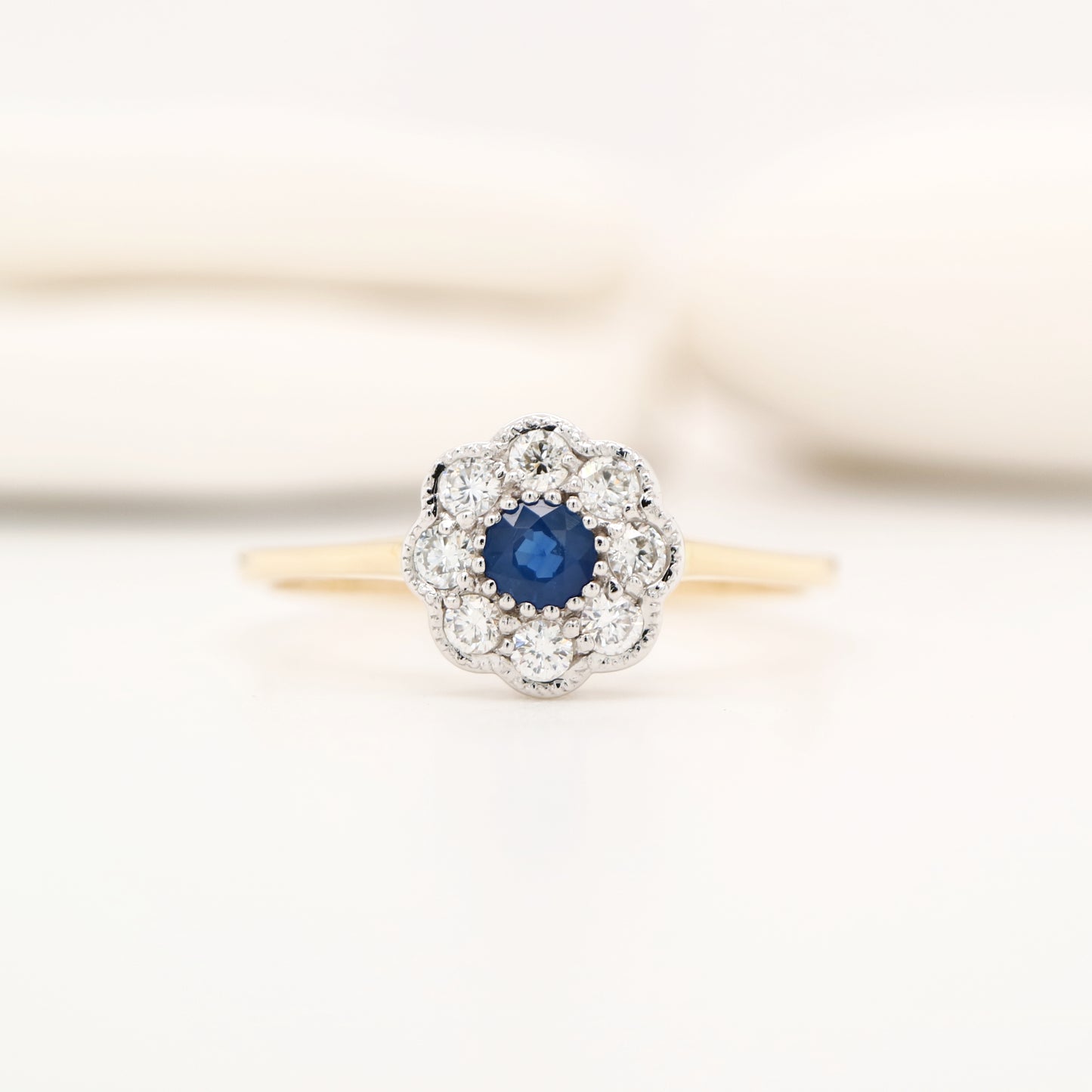 Dainty daisy ring with natural sapphire and diamond in 9k twin gold