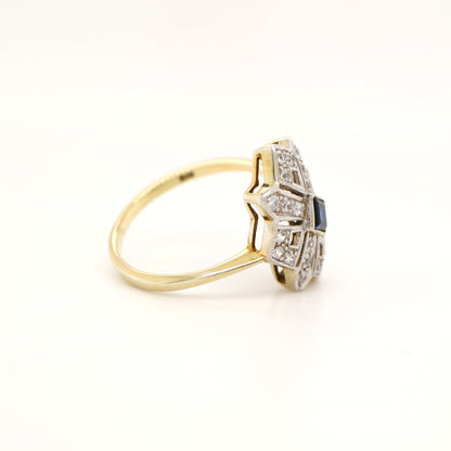 Starburst shield ring with natural sapphire and diamond in twin gold