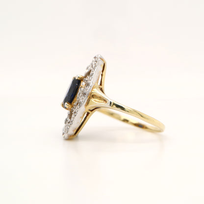 Blue sapphire and diamond cocktail shield ring in twin gold