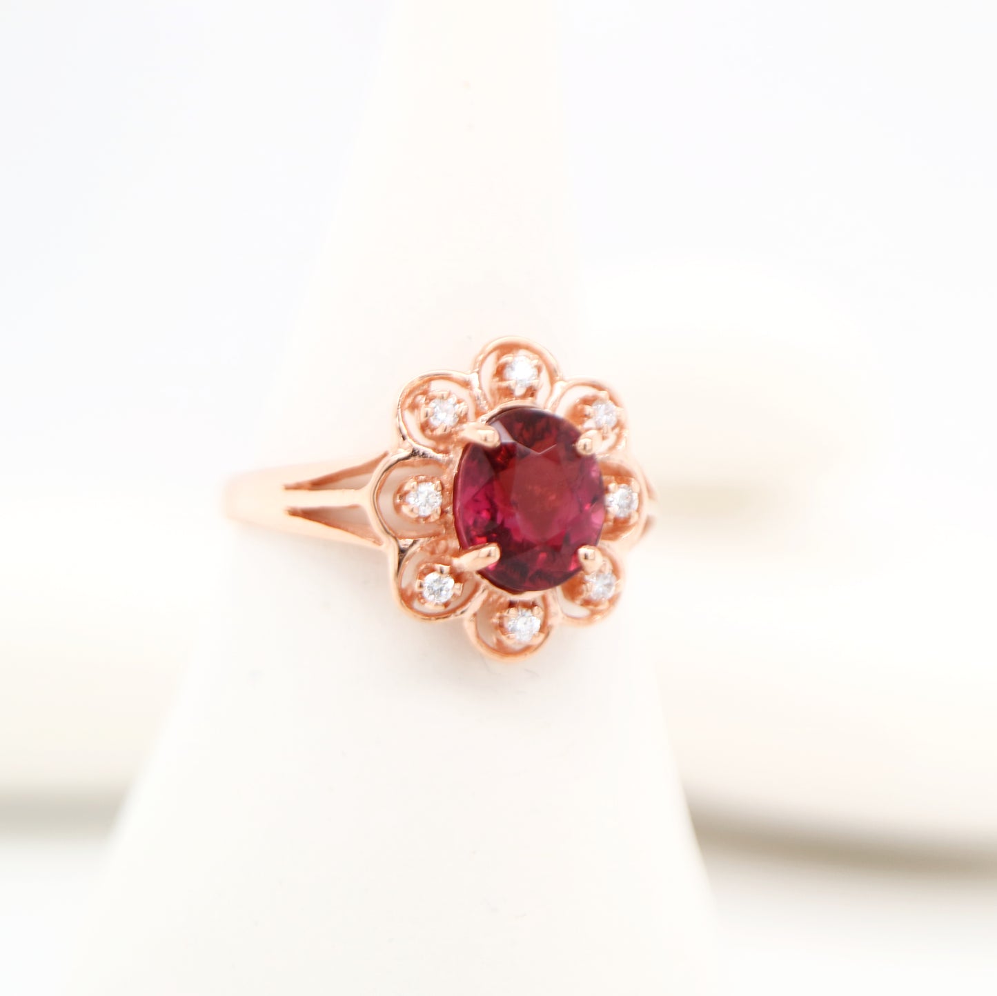 Floral diamond ring with tourmaline center in rose gold, Size P