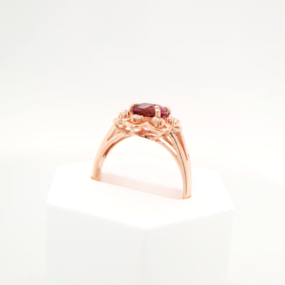 Floral diamond ring with tourmaline center in rose gold, Size P
