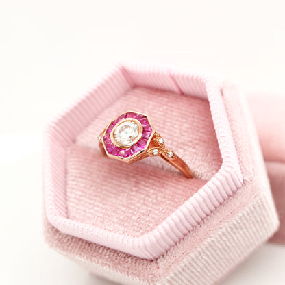 Target ring with moissanite and channel set natural ruby in rose gold