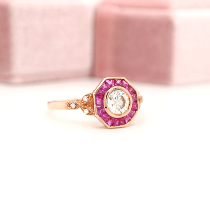 Target ring with moissanite and channel set natural ruby in rose gold