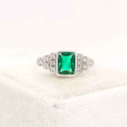 Art deco emerald ring and diamond in white gold