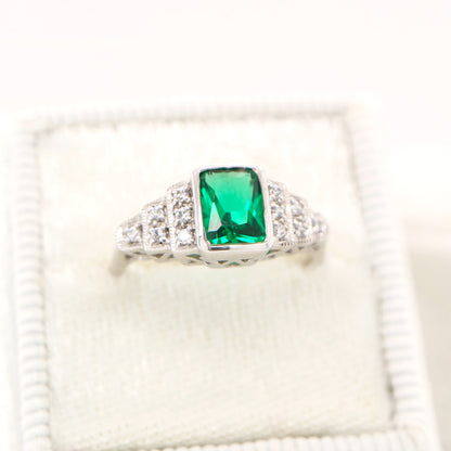 Art deco emerald ring and diamond in white gold