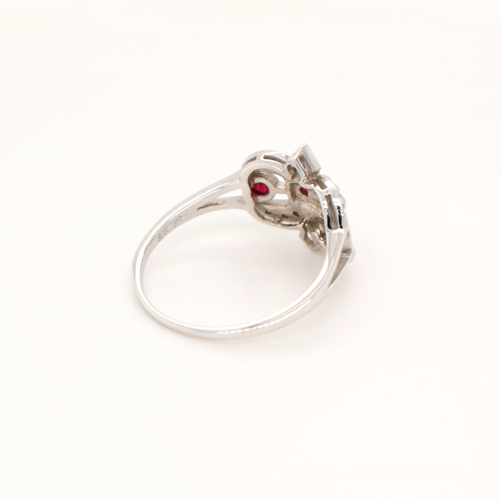 White gold fleur-de-lis ring with ruby and seed pearl