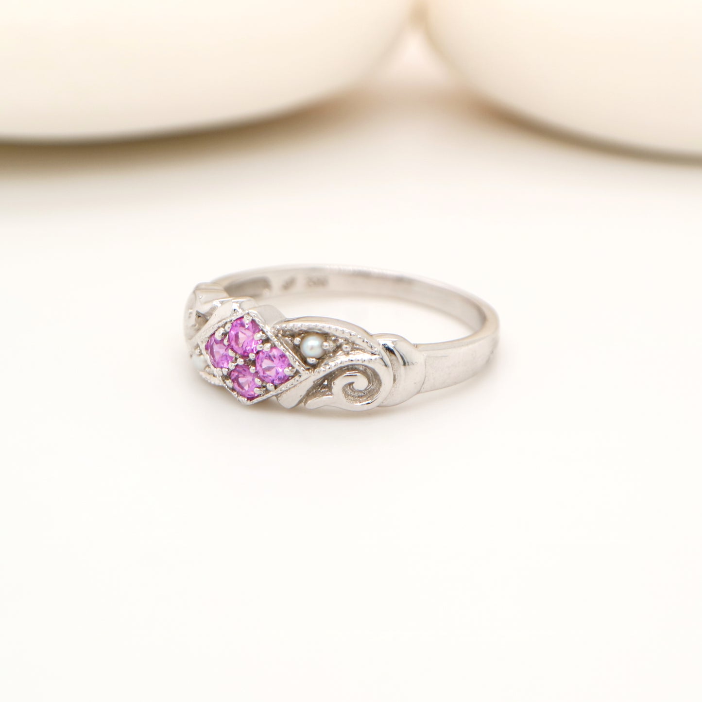 Gold, pink sapphire and pearl cluster ring