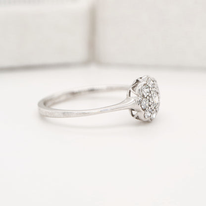 Dainty daisy diamond ring in white gold