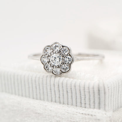 Dainty daisy diamond ring in white gold