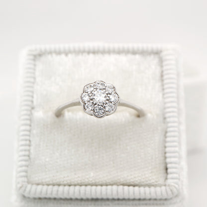 Dainty daisy diamond ring in white gold