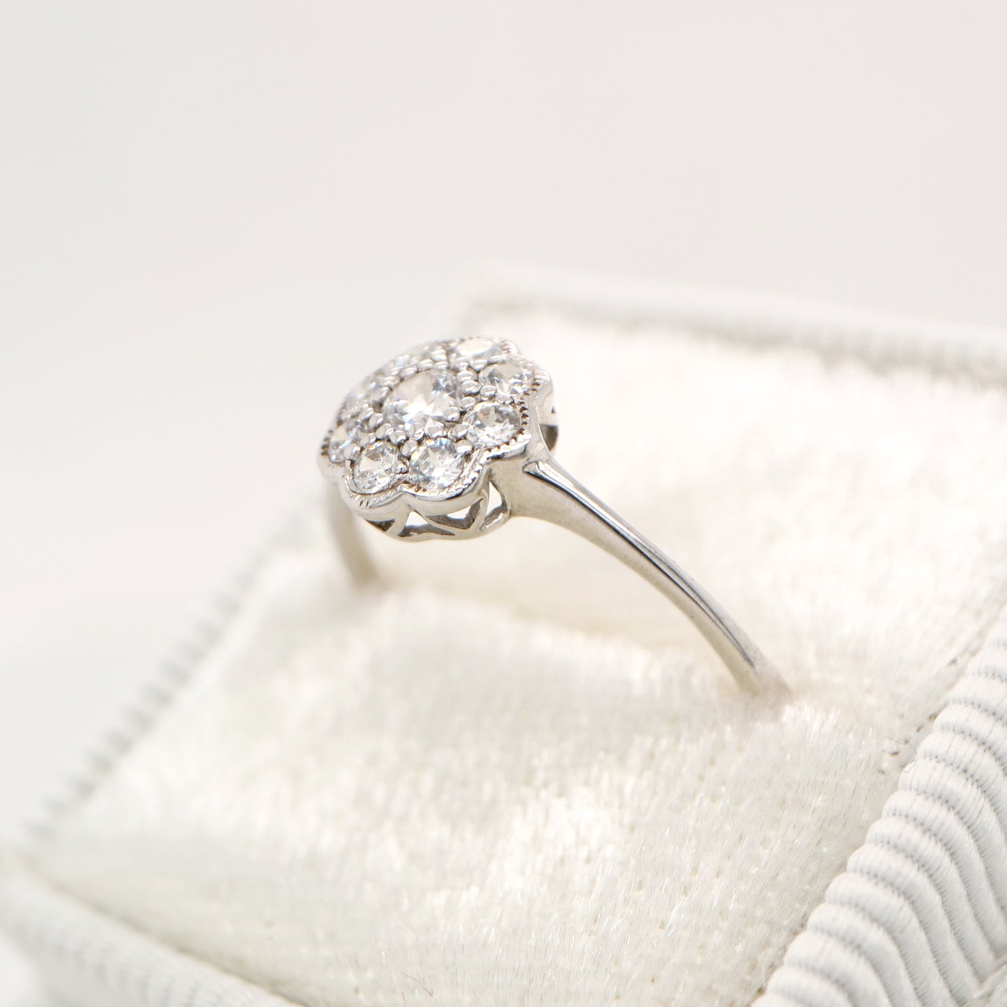Dainty daisy diamond ring in white gold