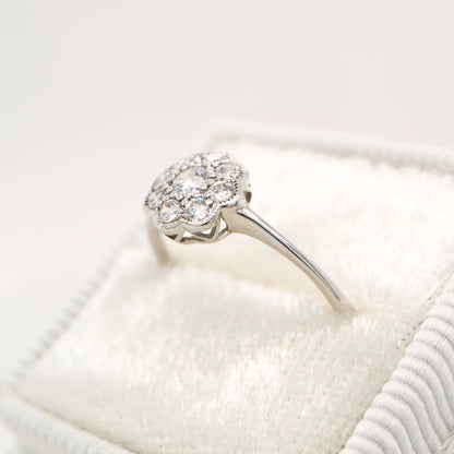 Dainty daisy diamond ring in white gold