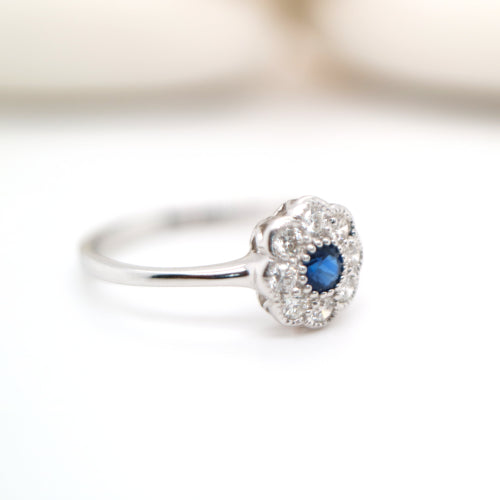 Dainty daisy ring with natural sapphire and diamond in 9k white gold