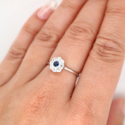 Dainty daisy ring with natural sapphire and diamond in 9k white gold