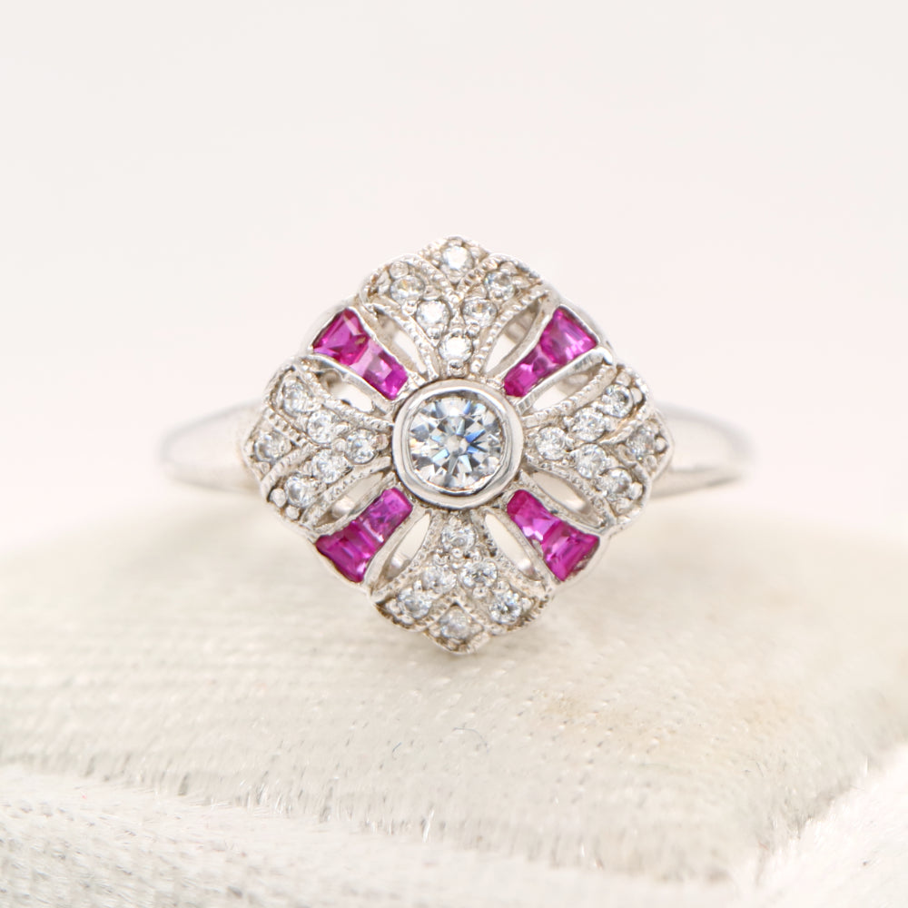 Art deco cross ring in white gold with ruby and diamond